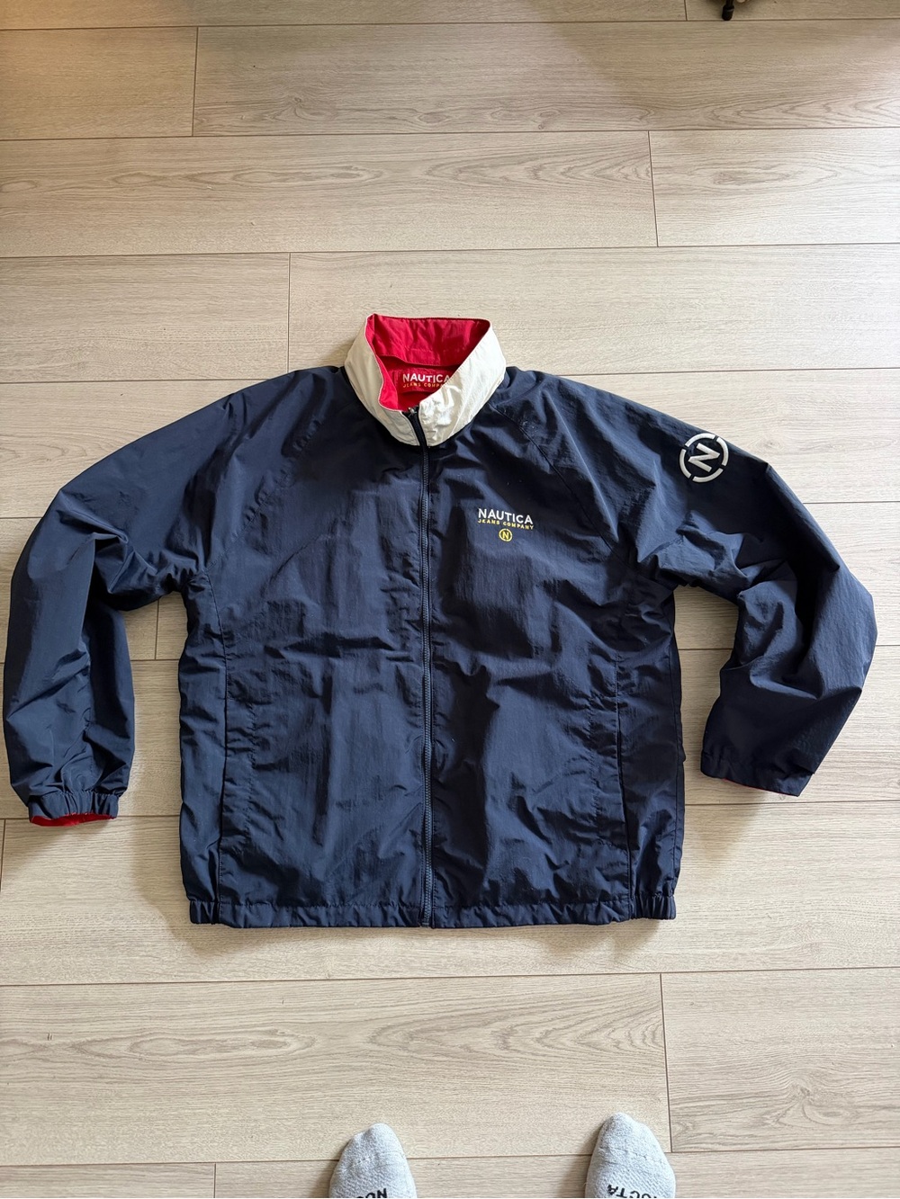 Nautica Navy Jacket with Red and White Collar Accents